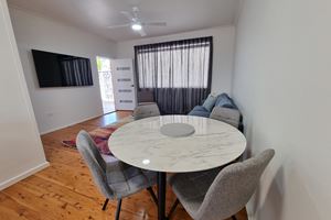 Living Room at Adamstown Short Stay Apartments.